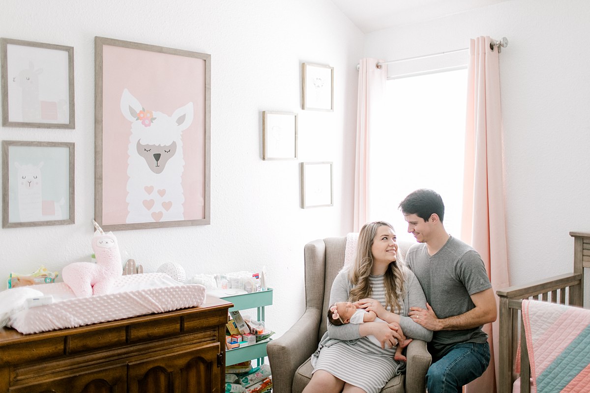 Fort Worth Lifestyle Newborn Photoshoot with Alayna in her Pink and White Llama themed nursery.